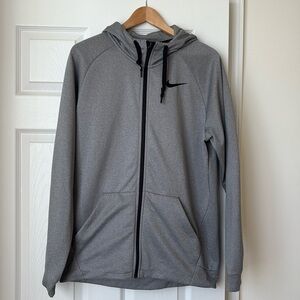 Used Mens Nike DriFit zip up hoodie in silver/grey color size Medium